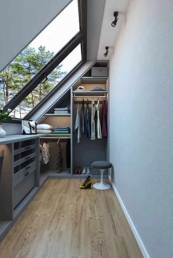 a small and narrow closet with built-in open storage units, shelves and drawers is a smart solution for a small home