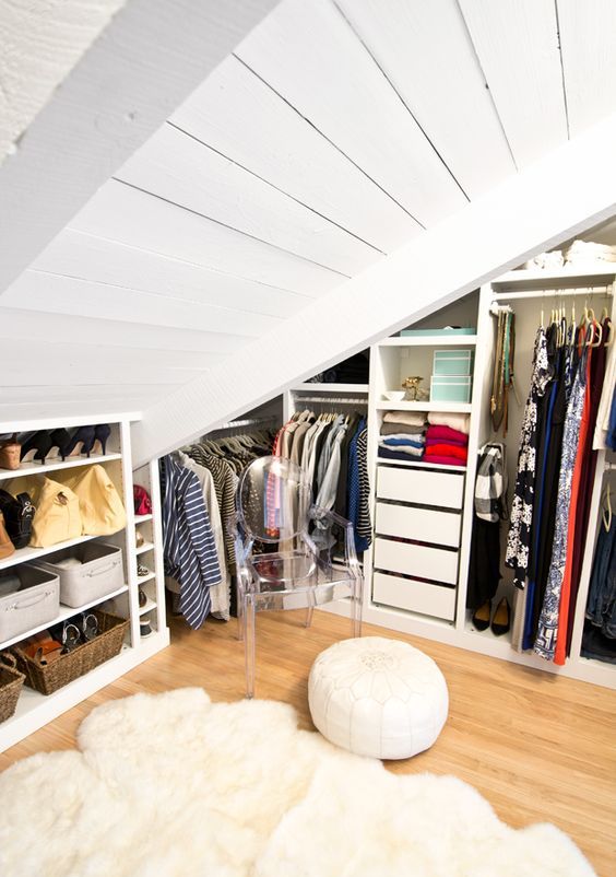 An attic closet with open storage compartments, drawers and built ins is a very cool and smart idea for a home with an attic space