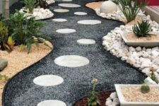 12 a stylish modern rock side yard with gravel and stepping stones, potted greenery and cacti is a cool space