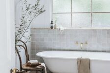 a lovely bathroom with a clawfoot tub