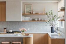 33 an airy contemporary kitchen with stained cabinets and a kitchen island, open shelves, a grey zellige tile backsplash
