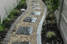 51 a narrow side yard styled with pebbles and stone pavements, greenery and little trees is a lovely and elegant space