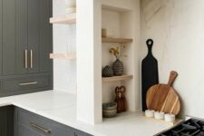 07 a modern farmhouse kitchen with graphite grey cabinets, built-in ones, a niche with small shelves that are used fro storage and display