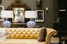 a living room with a stylish Chesterfield sofa