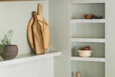 20 niche shelves used for storage and display in the kitchen look very sleek and seamless and allow you save some table space