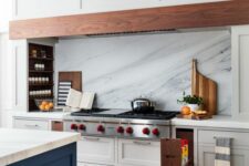 21 niche shelves with condiments and spices next to the cooker are a cool idea for a modern kitchen, they look very nice