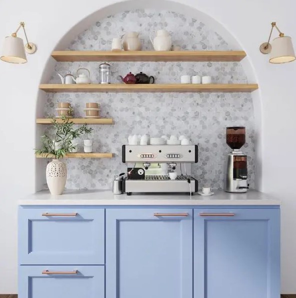 a home coffee bar with an arched niche with shelves showing off some mugs and teapots, a coffee machine and some greenery
