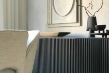 35 an IKEA Besta hack with black reeded panels, beautiful black decor and some art around for a luxurious look