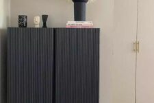 37 an IKEA Ivar cabinet hacked into a stylish and trendy black fluted piece on tall legs is amazing