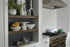42 a large niche with shelves, a chalkboard backdrop is a cool idea for a Scandinavian kitchen, it allows you store and display various stuff