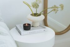 46 a beautiful nightstand with a reeded base and a stone tabletop is perfect for a refined bedroom in neutrals