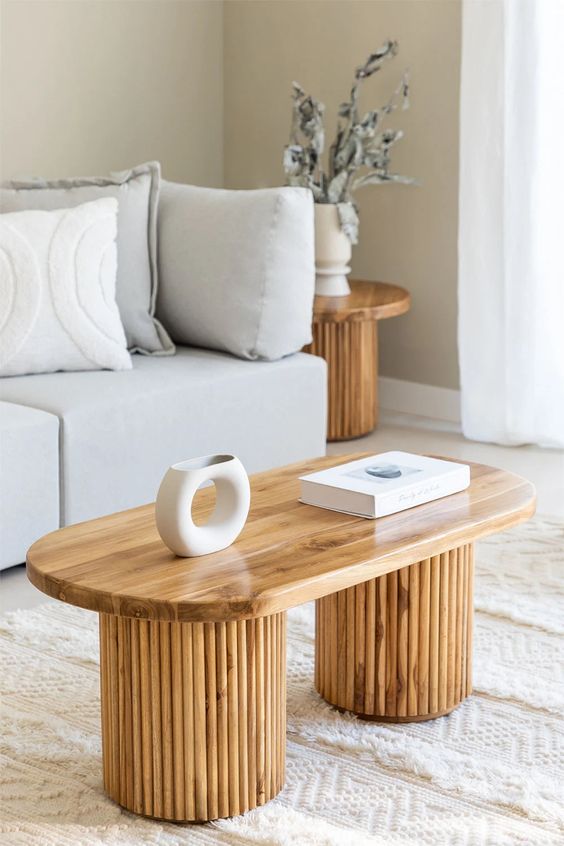 a stained coffee table or a bench with fluted legs is a cool idea for a modern or Scandinavian space