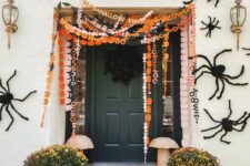 04 orange, black and white and pink paper Halloween banners with letters are a cool idea for a porch or a mantel