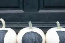 04 simple DIY black and white moon phase pumpkins are amazing for modern Halloween or fall decor, and they will be great for constellation decor