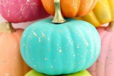 06 neon blue, green, orange, pink and yellow pumpkins with gold splatters are fantastic for Halloween decor