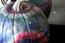 07 a beautiful blue, pink, grey and purple galaxy pumpkin with little white and silver stars and constellations for Halloween