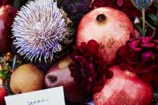 07 a bright and catchy centerpiece of bold dahlias, pears, pomegranates, thistles and apples is lovely for the fall