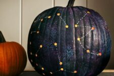 07 a dark galaxy pumpkin with constellations is a beautiful solution for Halloween styling