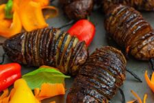 08 creepy-looking baked hasselback potatoes made to look like bugs are the perfect Halloween healthy snack