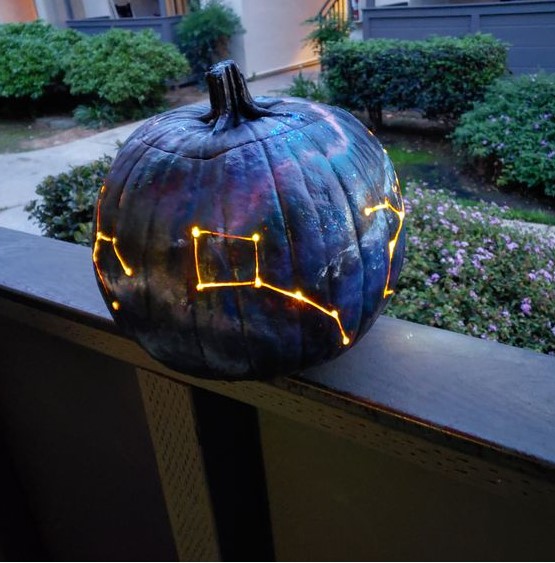 a gorgeous galaxy pumpkin luminary in black, navy and purple is a fantastic idea for Halloween, it looks bold