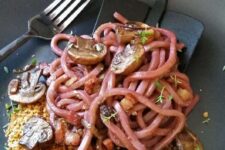 12 noodles with mushrooms and pancetta look like worms and will be great for Halloween parties
