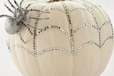 13 a sparkling pumpkin with rhinestones and a silver spider for a glam feel is a pretty solution for Halloween