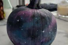 14 a fabulous black, blue, grey, purple galaxy pumpkin with tiny white stars painted is amazing for Halloween decor