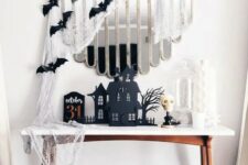 a chic halloween console table decor