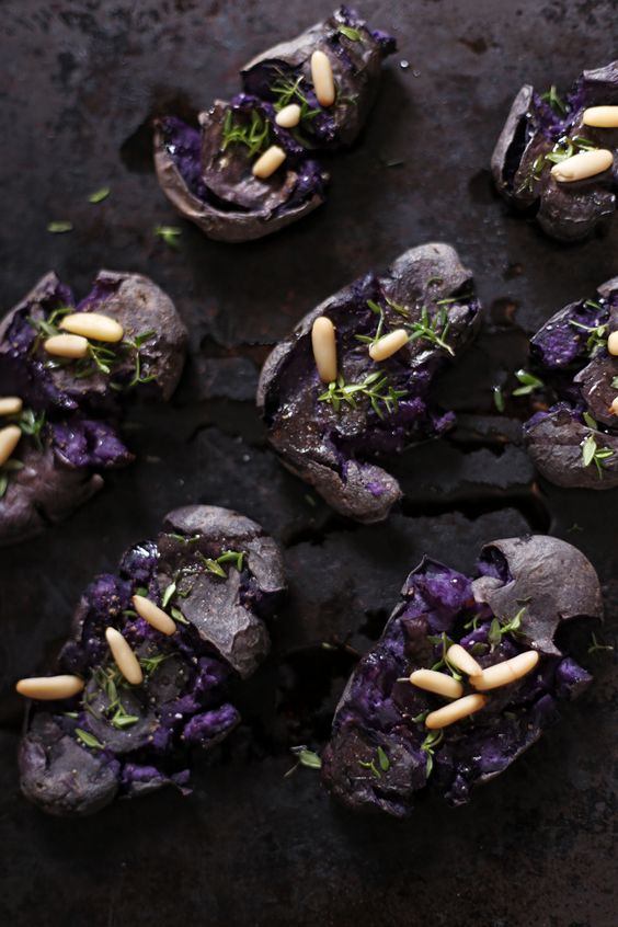 smashed purple potatoes with pine nuts and thyme look scary enough and moody and are great for Halloween