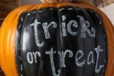 16 a Halloween pumpkin with a chalkboard touch and some chalk paint plus a burlap bow is a rustic decor idea