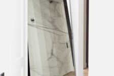 16 a large floor mirror with realistic spiders and spiderweb is a stylish solution for a modern Halloween space