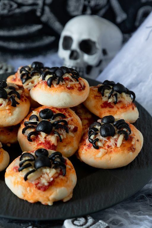 scary pastry with tomatoes, cheese, olive spiders are great for Halloween, these are spooky food examples
