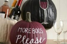 18 a matte burgundy pumpkin, a glossy black one with letters and a wine glass crafted on the pumpkin are amazing for Halloween