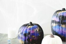 19 black, purple and gold galaxy-themed pumpkins are amazing for Halloween, bold, catchy and mysterious