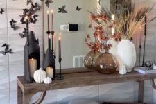 20 elegant Halloween mirror decor with black paper butterflies is a cool and chic idea that is non-typical