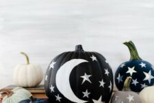 20 lovely grey, navy and black pumpkins with painted white stars and moons and lovely holographic star stickers are wow