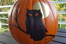 21 a painted Halloween pumpkin with a moon and an owl is a cool and bold decoration, and you need only some paint