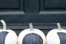 21 simple DIY black and white moon phase pumpkins are amazing for modern Halloween or fall decor, and they will be great for constellation decor
