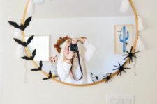 21 simple and cool Halloween mirror decor with white ghost tassels, black bats and spiders is a cool and fast to make idea