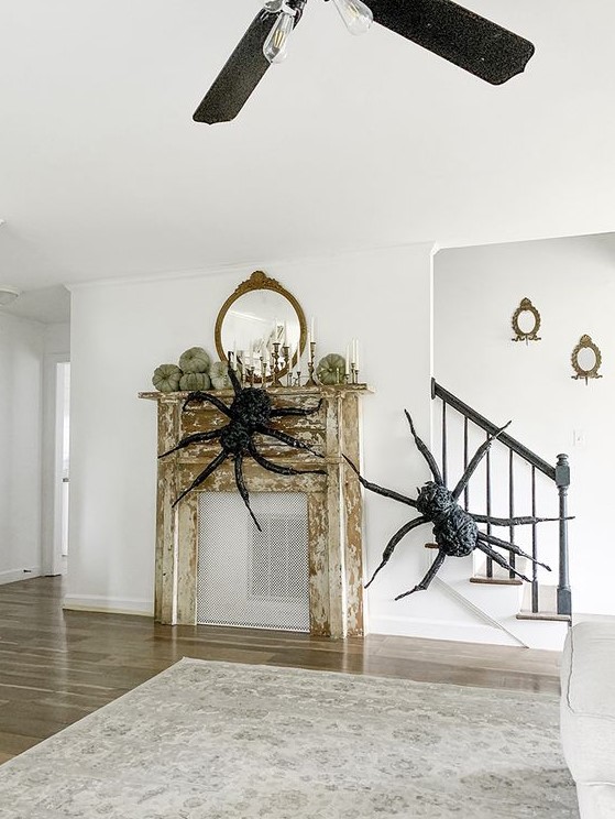 a duo of giant realistic spiders will easily turn your space into a Halloween one and will do that with style