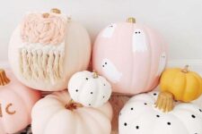 26 an arrangement of cool blush and white pumpkins, with polka dots, ghosts and macrame is amazing