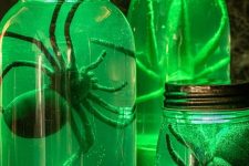 27 creepy Halloween specimen jars that glow brightly in the dark and contain giant spiders will be a nice prop for both a kid and an adult party