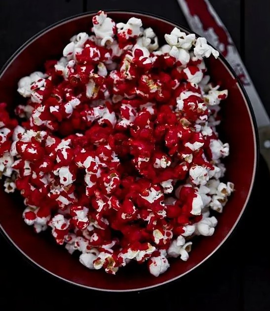 bloody popcorn is an easy and delicious treat for your Halloween party, and you can make it easily
