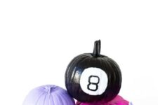 32 colorful and neon pumpkins with various decor and letters for a bright Halloween party