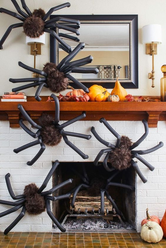 such oversized spiders covering a mantel and a fireplace or some wall in your home will instantly give it a Halloween feel