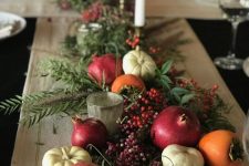 36 bold and catchy fall table decor with pomegranates, pumpkins, some fruit, greenery and candles is lovely
