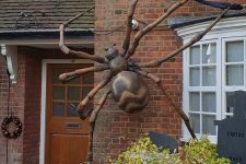 37 a giant and very realistic-looking spider will instantly make your house look very Halloween-like and you won’t need any other decor
