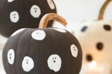 41 make some easy matte black pumpkins with ghosts for your kids’ Halloween party
