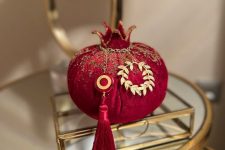 42 a catchy and chic velvet pomegranates is a nice decoration for the fall and winter, it looks chic and super cute