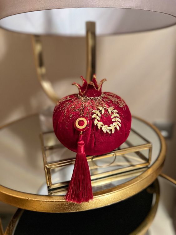 a catchy and chic velvet pomegranates is a nice decoration for the fall and winter, it looks chic and super cute